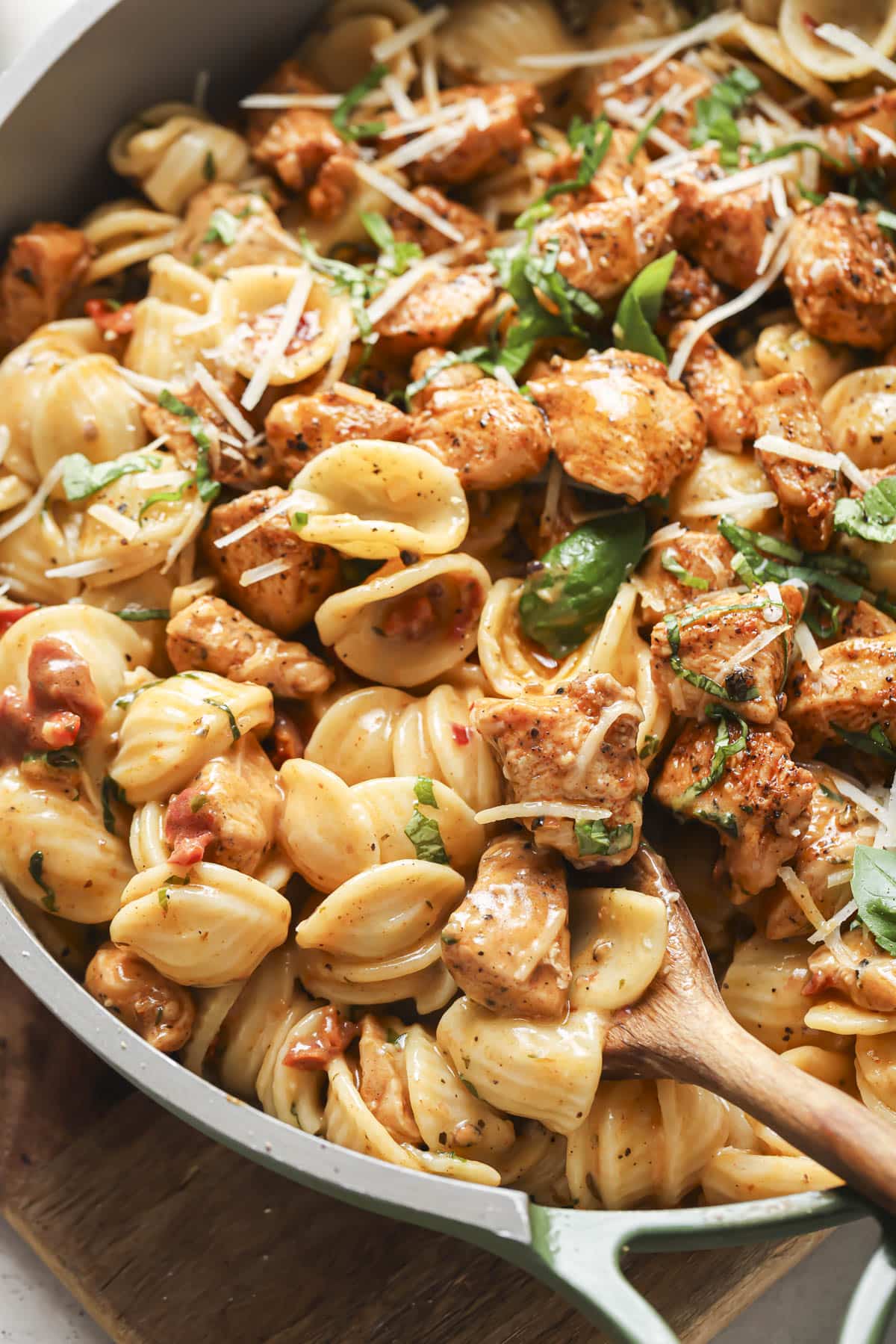 Marry Me Chicken Pasta cooking in a large skillet.