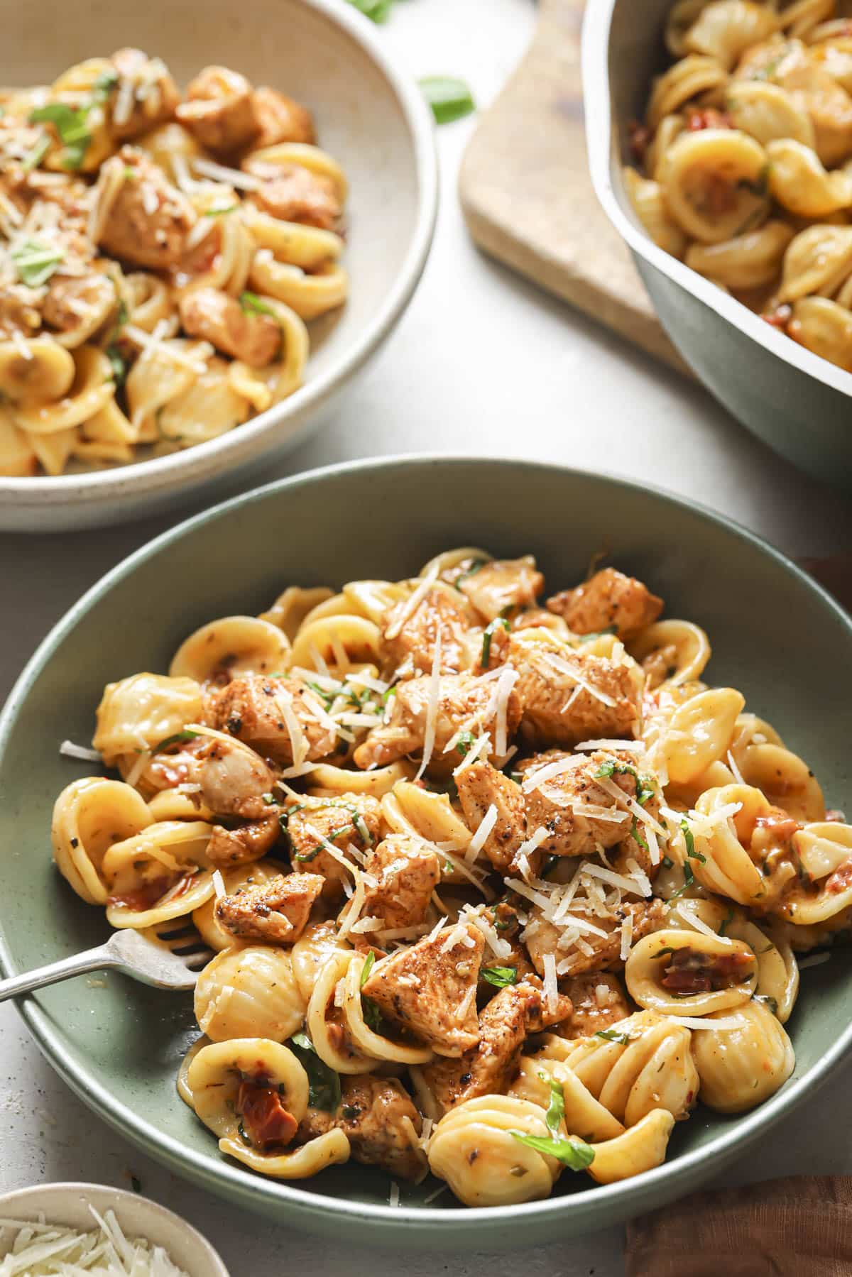Marry Me Chicken Pasta served in a bowl with a fork.