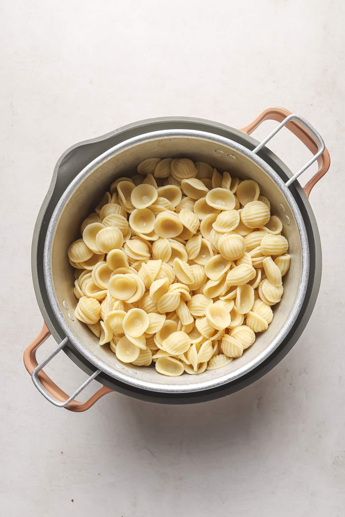 Draining pasta in a colander. 