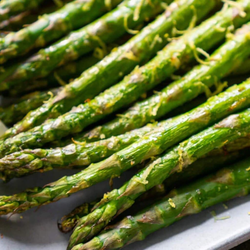 Asparagus on a white plate.