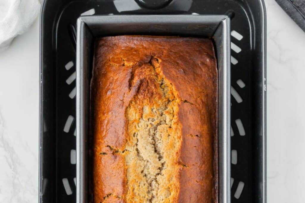Golden brown banana bread in the air fryer.