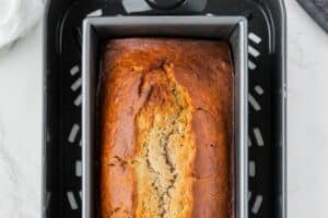 Golden brown banana bread in the air fryer.