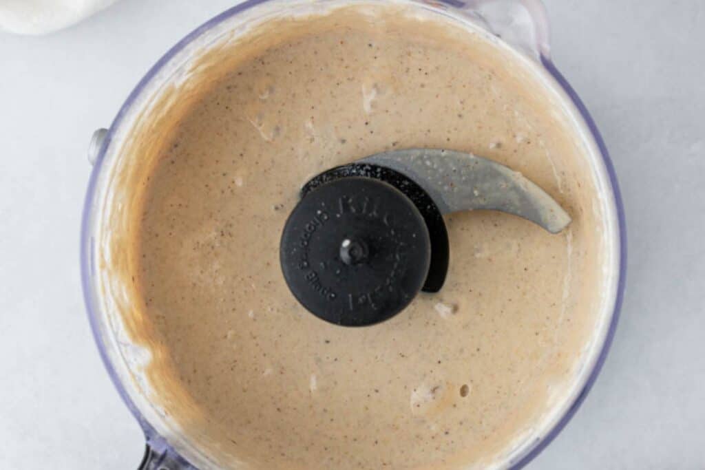 Tahini sauce in a food processor.