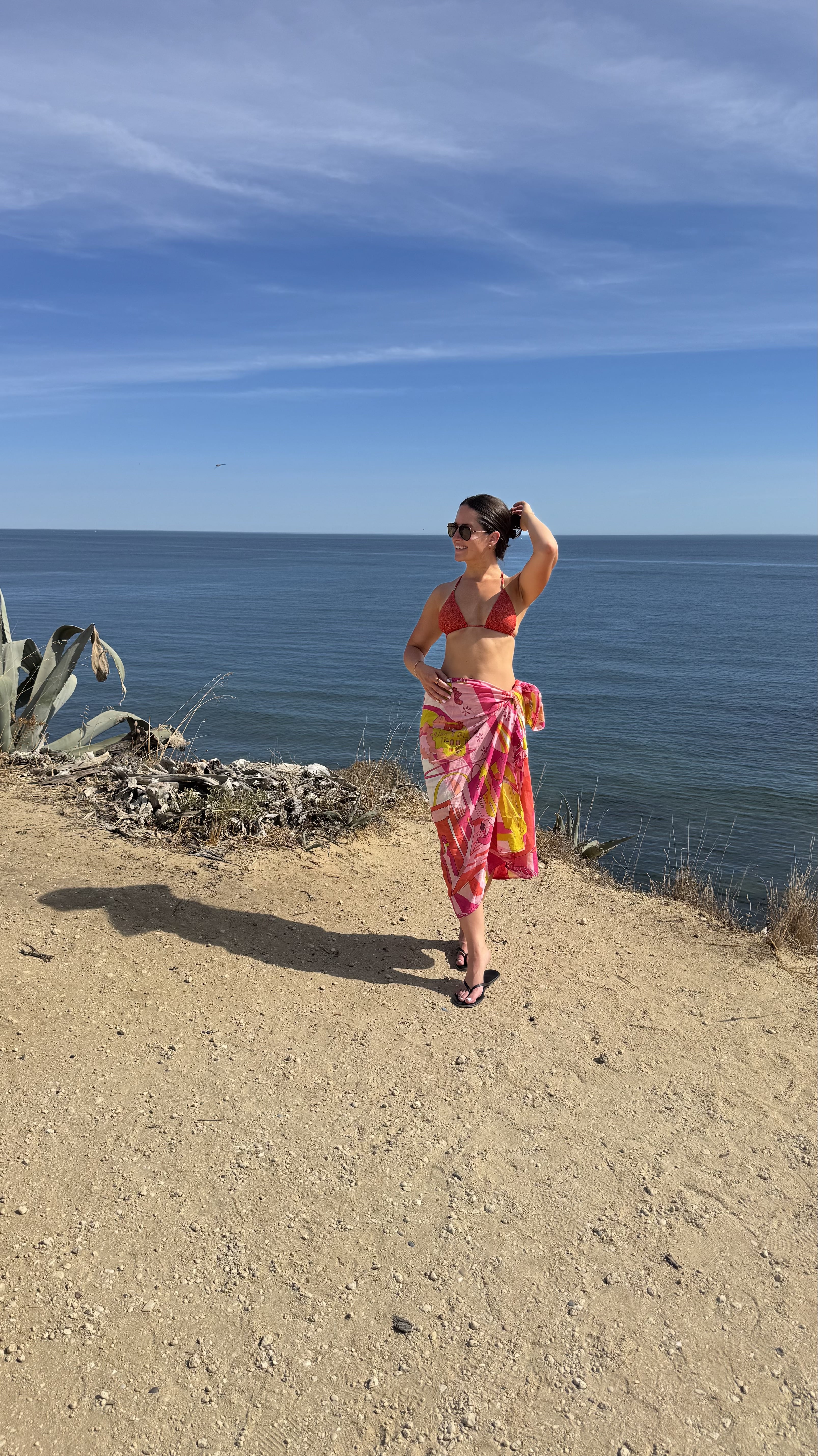 Jordan Zelesnick from JZ Eats on an oceanside cliff.