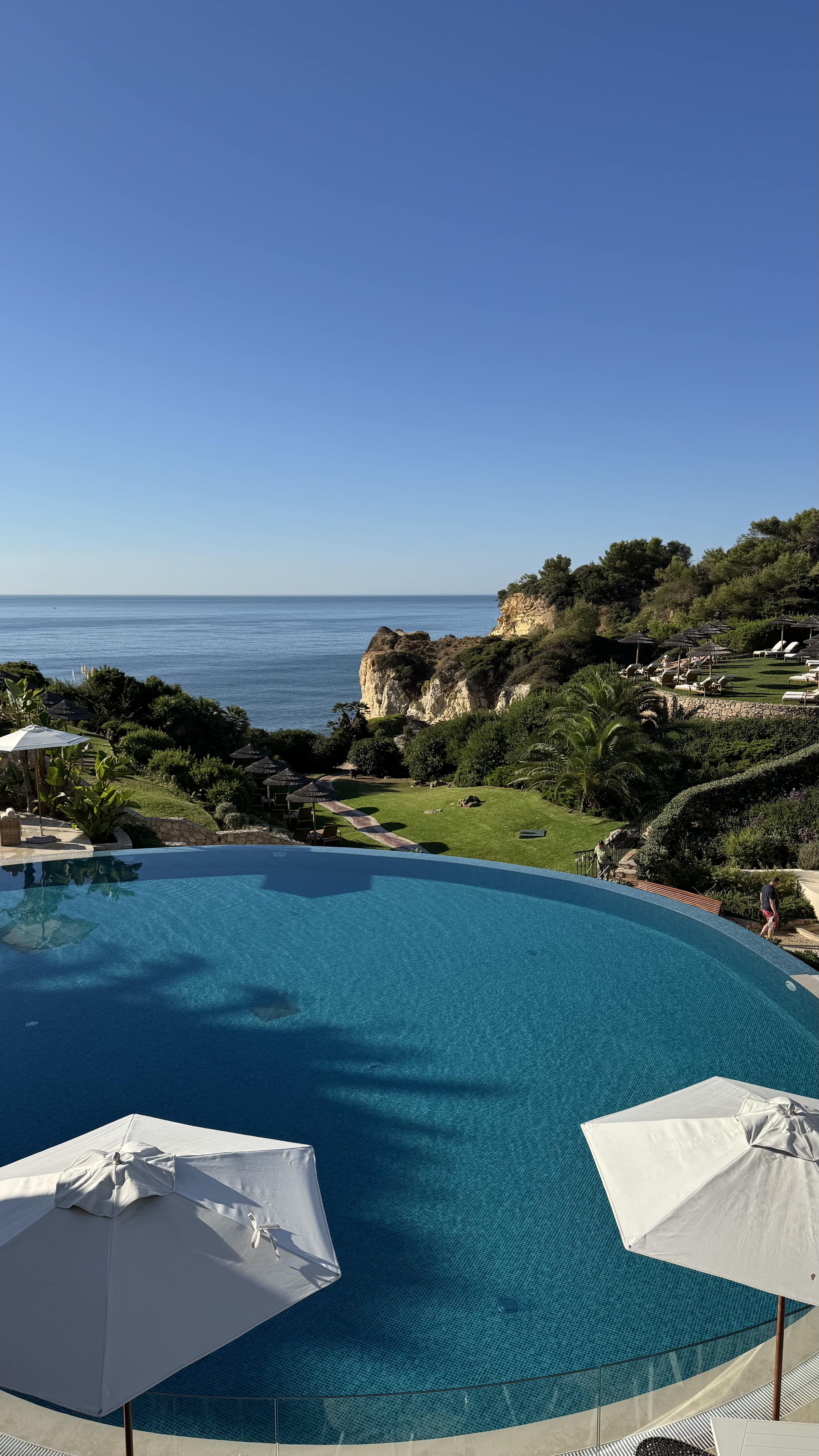 An infinity pool overlooking an ocean.
