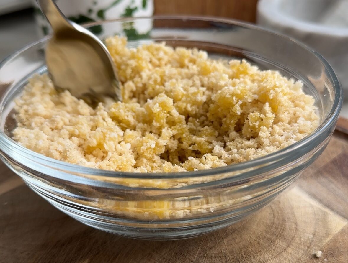 Panko bread crumbs in a small glass mixing bowl.