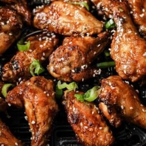 Closeup of air fryer asian wings.