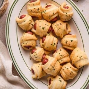 A plate of air fryer pigs in a blanket.