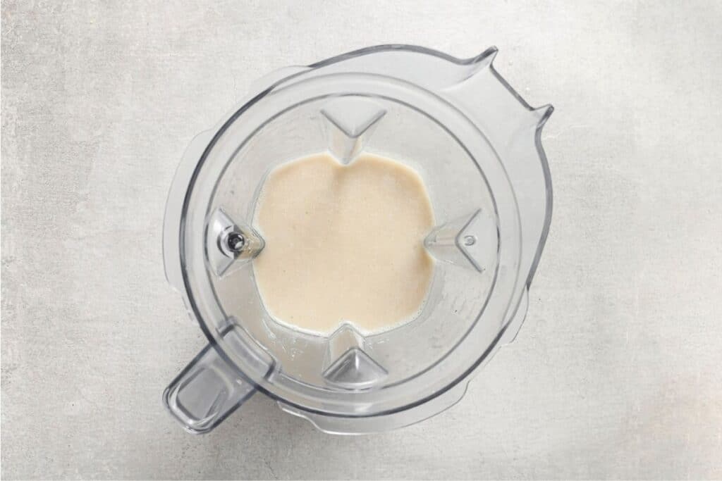 a blender with the cannellini bean mixture blended smooth 