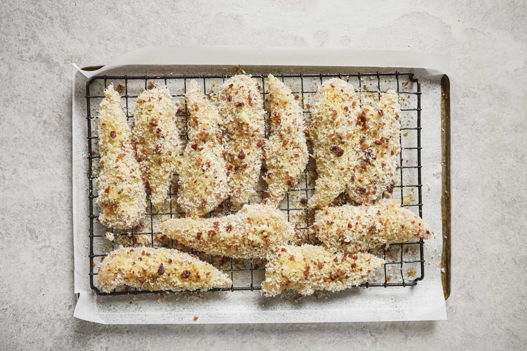 baked bacon ranch chicken on a wire rack before broiling