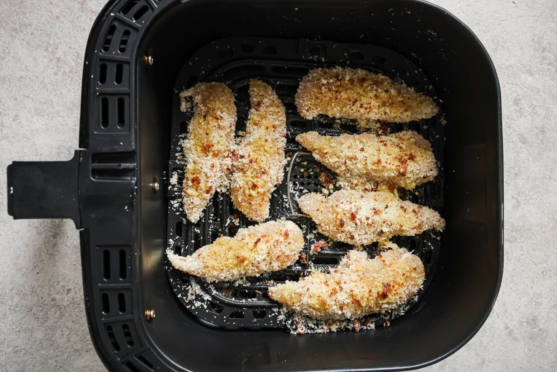 chicken bacon ranch tenders in an air fryer basket